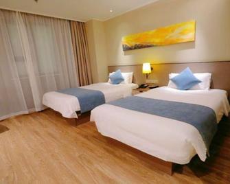 Home Inn Plus - Dalian - Habitación