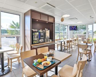 بد آند بريكفاست هوتل لا روش-سور-يون - لاروش-سور-يون - مطعم