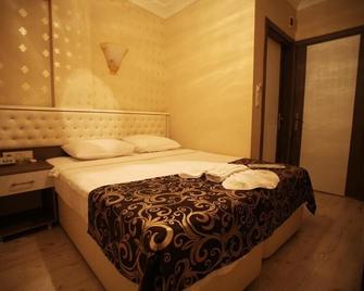 Bursa City Hotel - Bursa - Habitación
