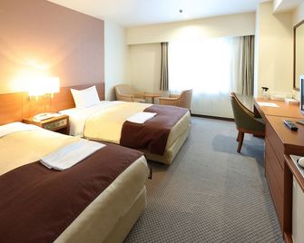 Hotel Pearl City Morioka - מוריוקה - חדר שינה