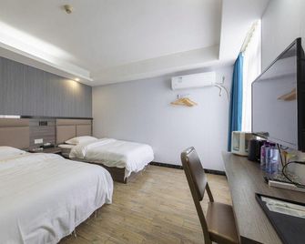 Qingfeng Apartment (Guangzhou Jianggao Commercial Pedestrian Street) - Cantón - Habitación