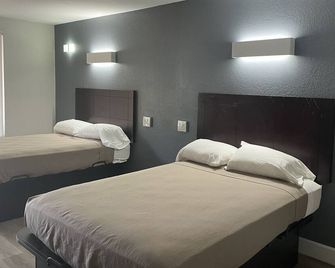 Hotel Casa by Arya - Carrollton - Camera da letto