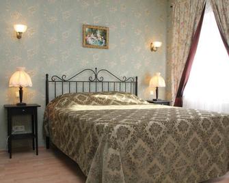 Abrikos Hotel - 彼爾姆 - 臥室
