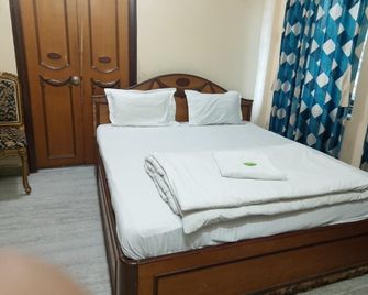 Raviz Inn - Calcuta - Habitación
