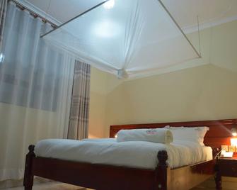 Detim Hotel - Mukono - Bedroom