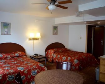 Econo Inn - Anchorage - Schlafzimmer