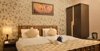 Hotel Meenakshi Udaipur - Udaipur - Slaapkamer