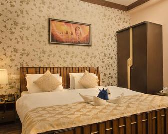 Hotel Meenakshi Udaipur - Udaipur - Bedroom