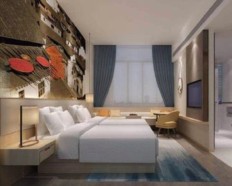 Qiwu Hotel - Xuancheng - Camera da letto