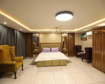 Starex-Inn - Gurugram - Phòng ngủ