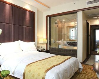 Tianbao Hotel - Фушунь - Спальня
