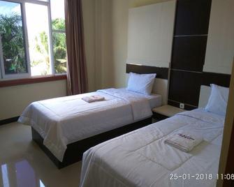 Galaxy Inn - Baubau - Habitación