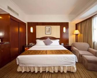Fujian Sunshine Holiday Hotel - Fuzhou - Bedroom