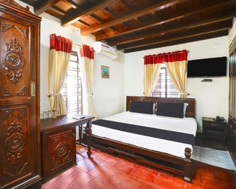 Hotel O Victoria Hotels & Resorts - Chalakudy - Bedroom
