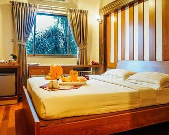 Hotel 63 - יאנגון - חדר שינה