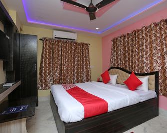 Hotel O Red Velvet Inn Near Chinar Park,Airport - Madhyamgram - Bedroom