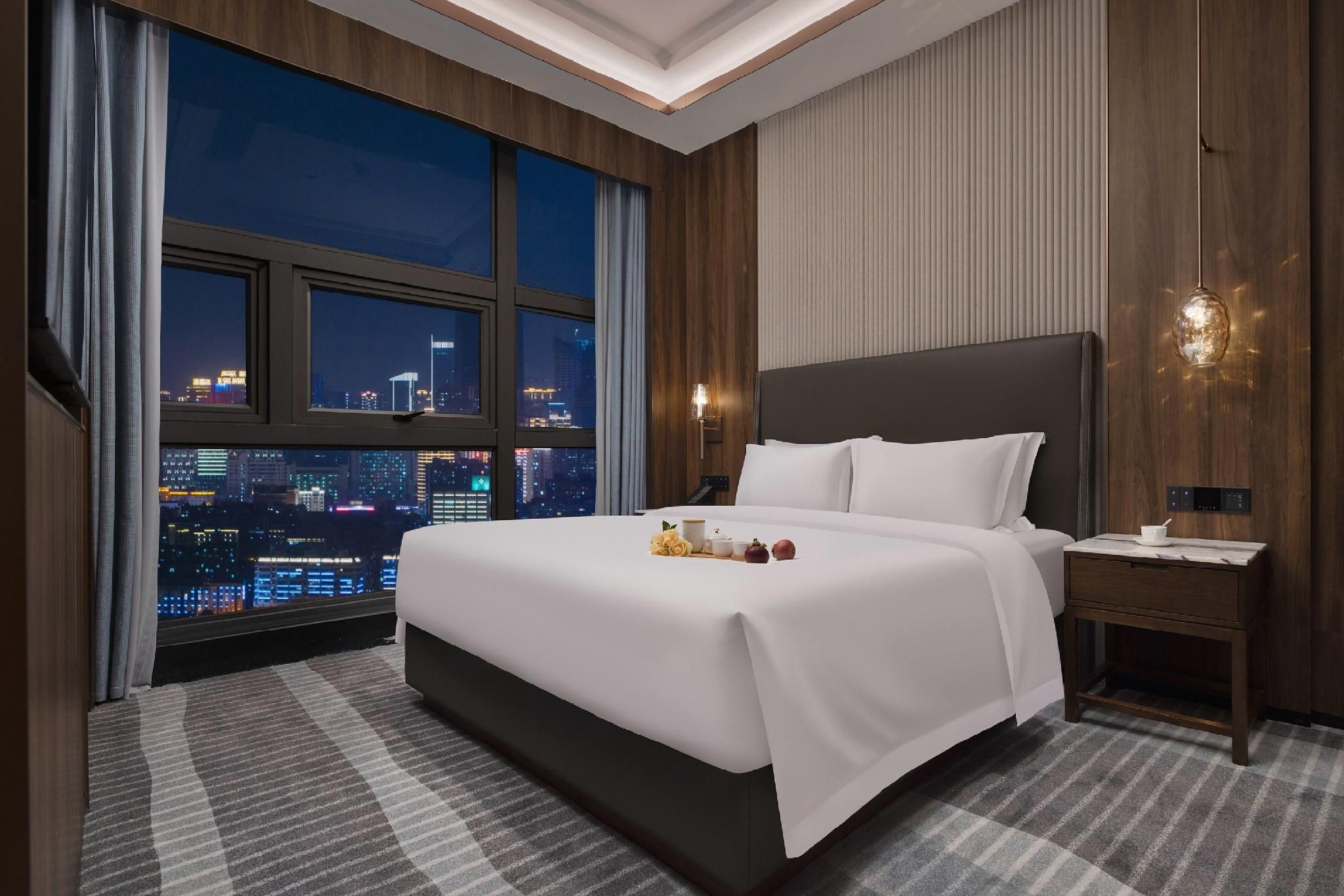 Kang Nian Shi Jia Hotel - تشانغشا - غرفة نوم