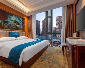 Wanyi International Hotel - Guiyang - Schlafzimmer