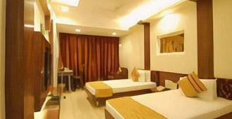 Hotel Shreemaya - Indore - Habitación