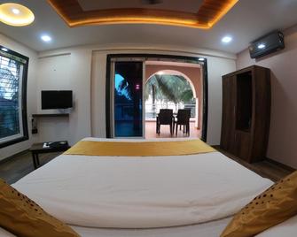 Jimmy Beach Resort - Alibag - Camera da letto