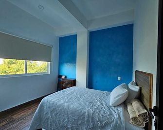 Hotel Familiar Abejac - Brisas de Zicatela - Habitación