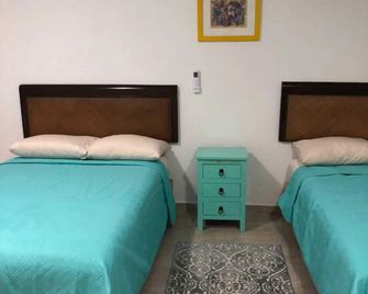 Airport Sleepy Inn - Κανκούν - Κρεβατοκάμαρα