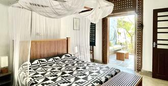 Isana Beach House - Tangalla - Schlafzimmer