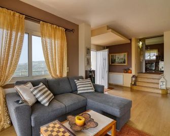The House Olympia - Happy Rentals - Olympia - Вітальня