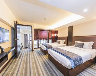 Huafei Haojiang Hotel - Quanzhou - Bedroom
