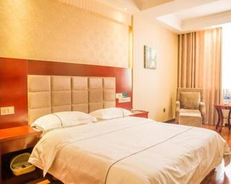 Greentree Inn Jiayuguan Xinhua Nan Road - Jiayuguan - Slaapkamer