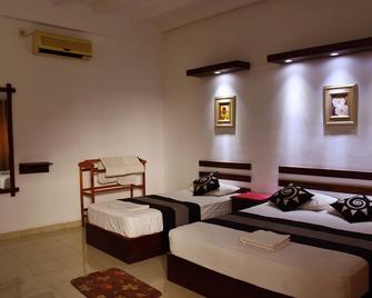 Sadula Holiday Resort - Anuradhapura - Anuradhapura - Schlafzimmer