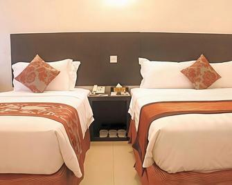 My Inn Hotel - Tawau - Slaapkamer