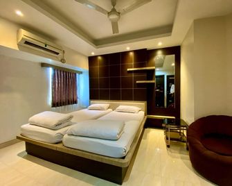 Sremon Inn - Calcutta - Slaapkamer