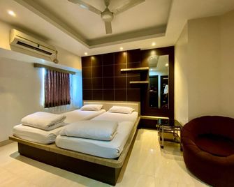Sremon Inn - كولكاتا - غرفة نوم
