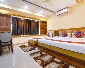 Fabhotel Seven Inn 3.0 - Bhubaneswar - Bedroom