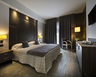 Hotel Desenzano - דסנצאנו דל גארדה - חדר שינה