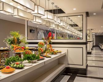 Ramada by Wyndham Makkah Zad Al Rawda - Mecca - Dining room