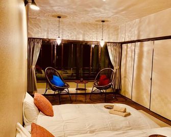 Guest House Toco.Toco - Yurihama - Schlafzimmer