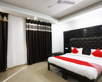 Super Collection O Tipsyy Inn - Gurugram - Habitación