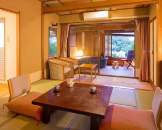 Smoking Openair bath by the ocean Japanesestyle room 10 tatami mats Two meals included / Kamo-gun Shizuoka - Nishiizu - Comedor