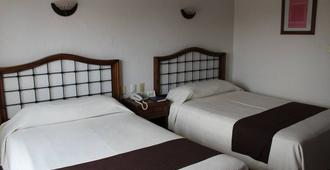 ホテル プラザ インデペンデンシア - ビジャエルモッサ - 寝室