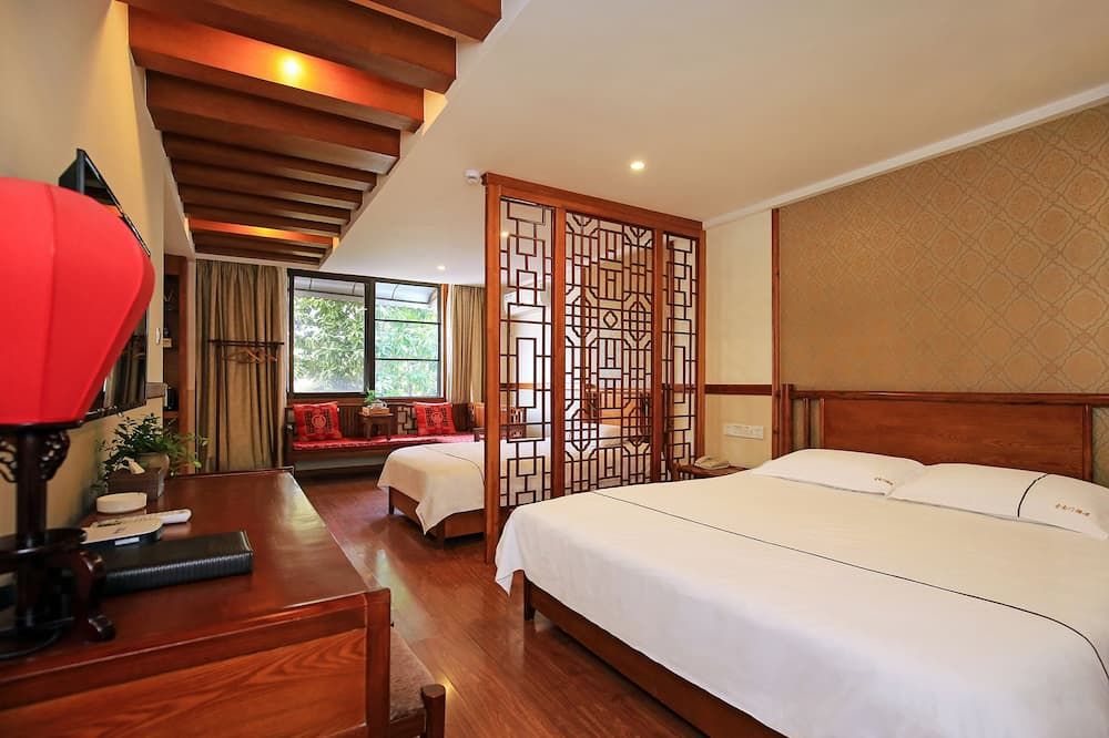 Guilin Gunanmen Hotel - גילין - חדר שינה