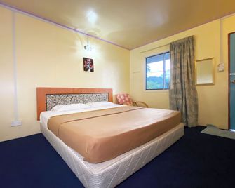 Hotel O Pogimpaan Homestay - Ranau - Habitación