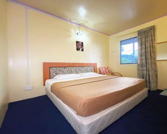 Hotel O Pogimpaan Homestay - Ranau - Camera da letto