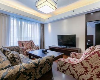 Beijing Henan Business Hotel - Beijing - Living room