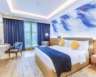 Mövenpick Grand Al Bustan Dubai - Dubai - Sovrum