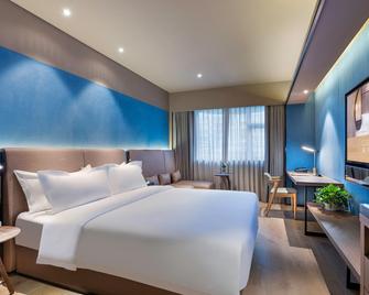 Orange Hotel Select Qingdao Wusi Square - Thanh Đảo - Phòng ngủ