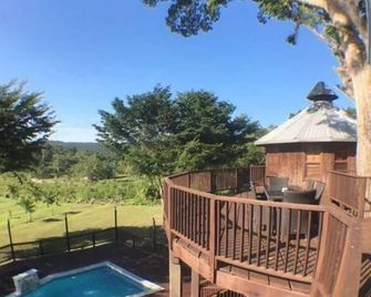 Exotic High End Unique Off-The-Grid Treehouse, steps away from the Mopan River! - Bullet Tree Falls