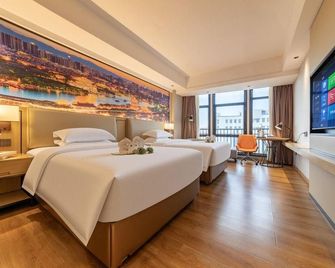 Dongshan xi da wei Hotel (Nanmenwan Branch) - Zhangzhou - Slaapkamer