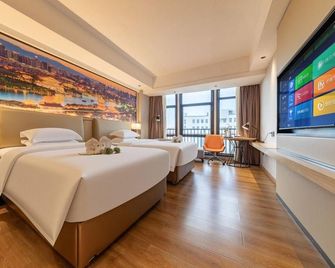 Dongshan xi da wei Hotel (Nanmenwan Branch) - Zhangzhou - Schlafzimmer